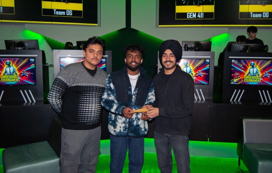 Pratham poses with the first place winning team in Nexus