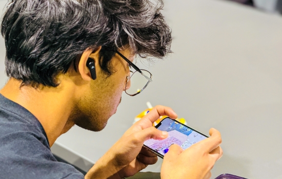 A student plays PUBG on his phone