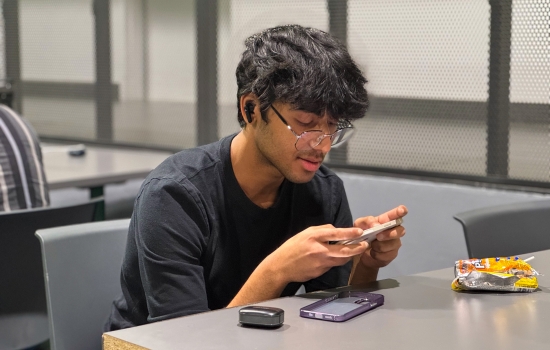 A student plays PUBG on his phone