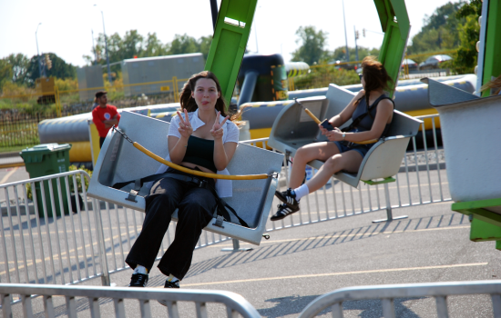 A student enjoying a Welcome Back Fest carnival ride