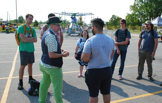 students enjoy busker entertainment