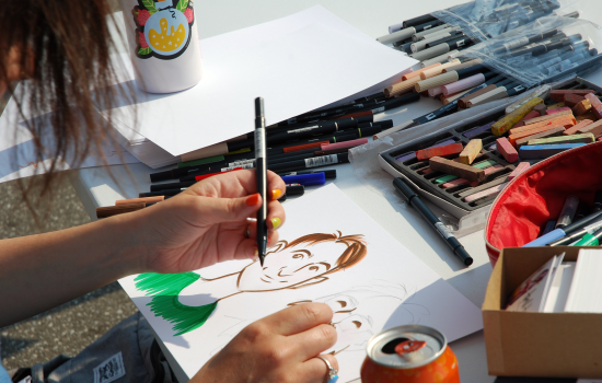 an artist drawing a caricature