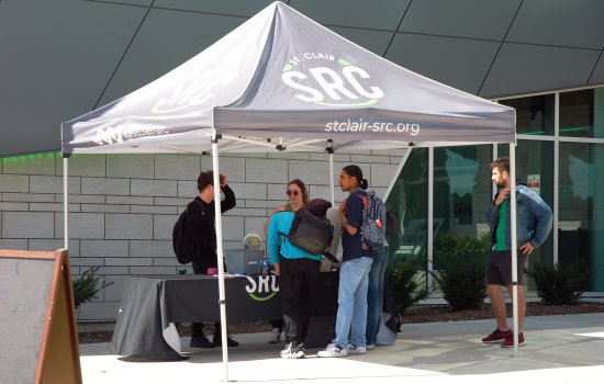 The SRC pop up tent with students signing up to use the Wreck Room