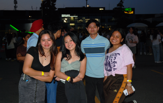 A group of 4 students at the DJ Colour Party