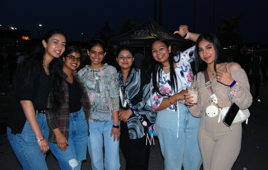 A group of 6 students at the DJ Colour Party