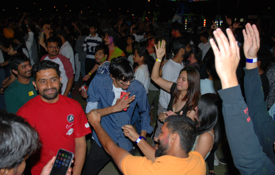 The crowd dancing at the DJ Colour Party