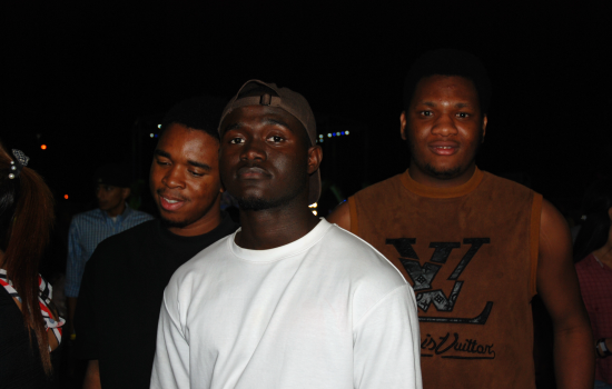 A group of 3 students at the DJ Colour Party