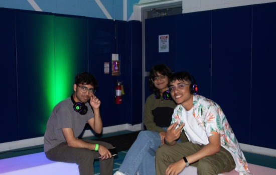 3 students at the Headphone DJ Party