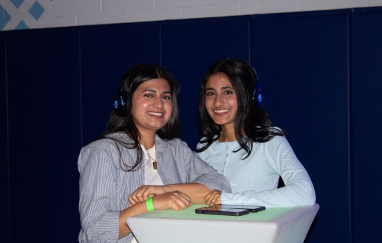 2 students at the Headphone DJ Party